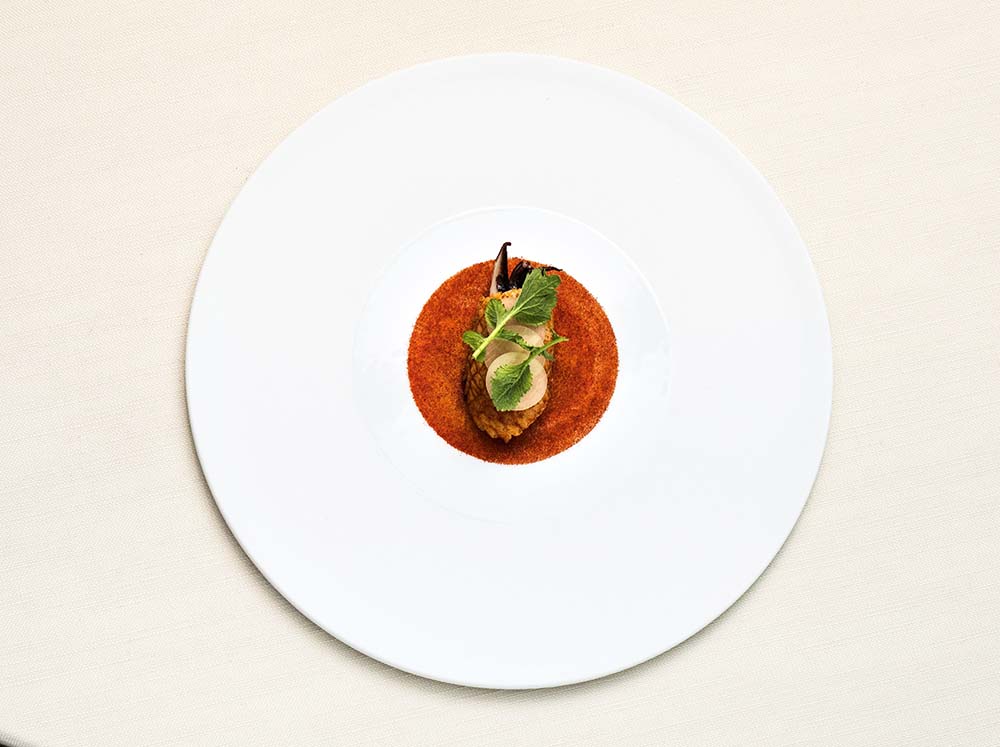 アプレアを代表する料理の一つ「スミイカのディアボラ風」。