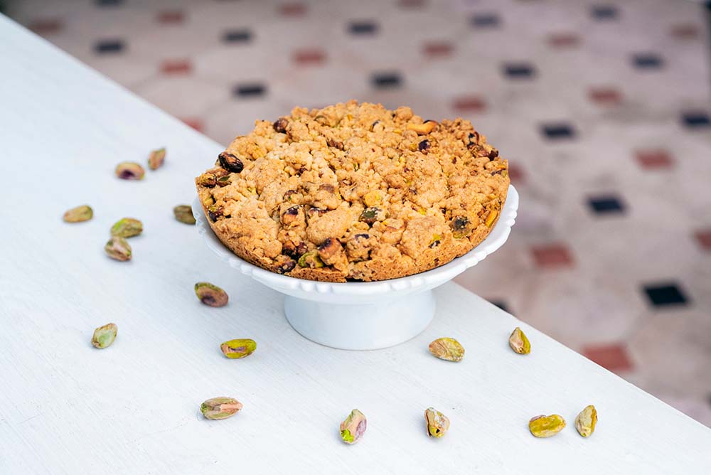 アブルッツォの三ツ星シェフ、ニコ・ロミート氏がレシピ開発したシチリア産ピスタチオのタルト。photograph by Luca Savettiere