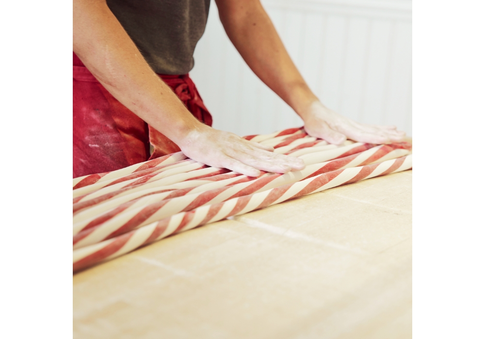 アメリア・エリクソン（Amelia Eriksson）というスウェーデン人女性が発明したキャンディ「エクタ・グレンナ・ポルカグリーサル」は、1859年にグレンナの町から製造の許可を得た。